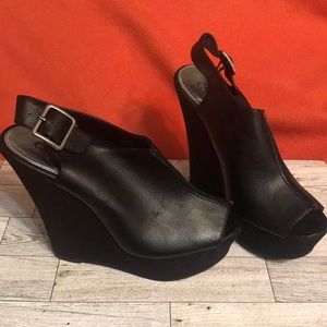 Black leather and suede platform heels